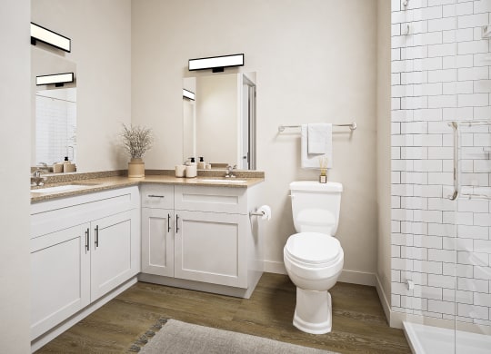 a white bathroom with a toilet and a sink